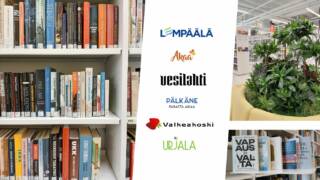 Kuva kirjastotilasta. Kuvan keskellä Lempäälän, Akaan, Vesilahden, Valkeakosken ja Urjalan kaupunkien logoista.